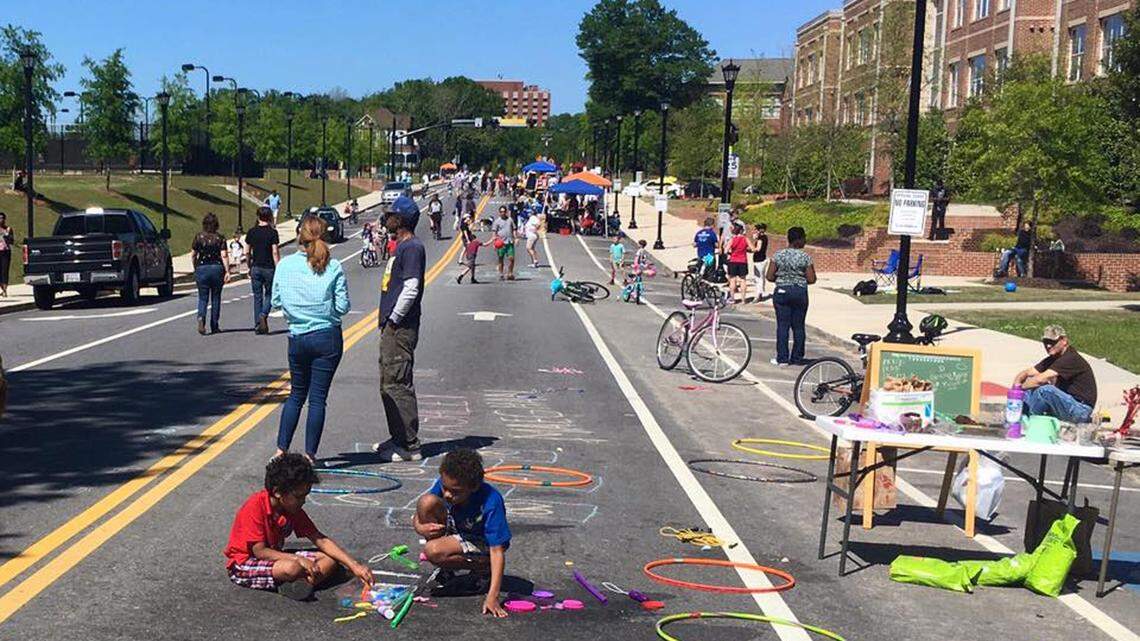 Streets in downtown Macon were supposed to be closed to vehicles and open to pedestrians and bicyclists Sunday, but rain postponed the event.
