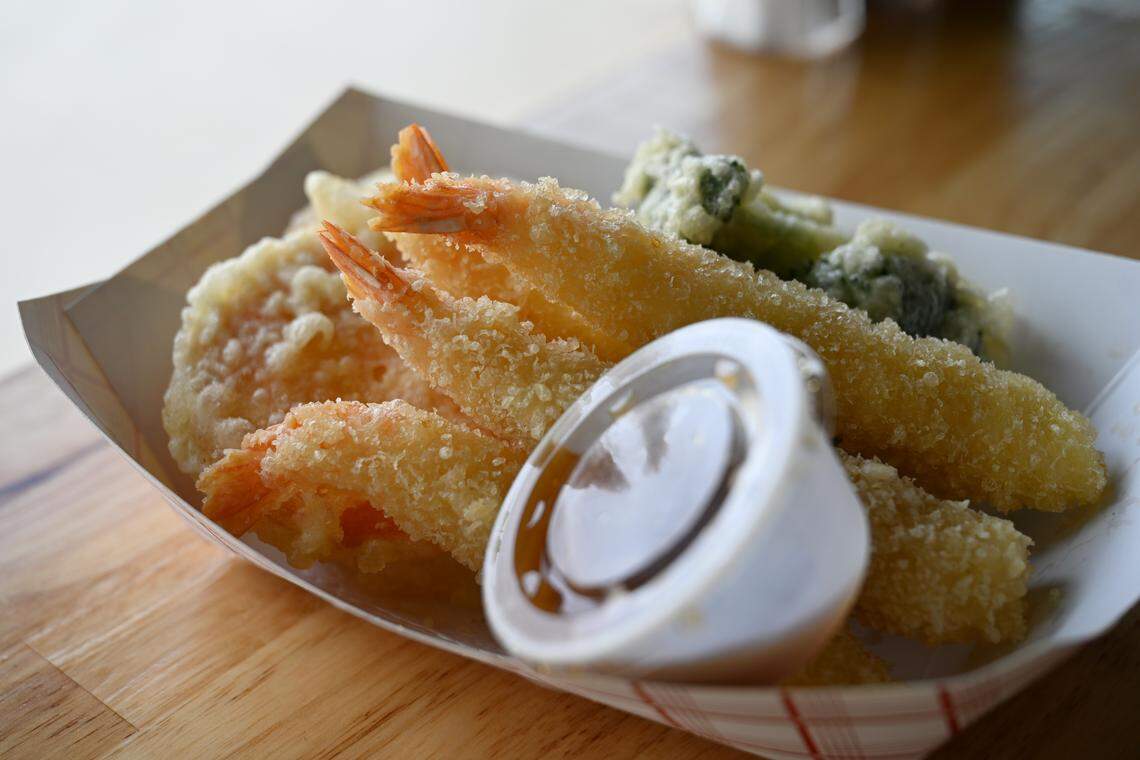 Tempura shrimp with deep fried sweet potato, onion and broccoli is one of several appetizers from the new Robins Poke & Ramen in Warner Robins.