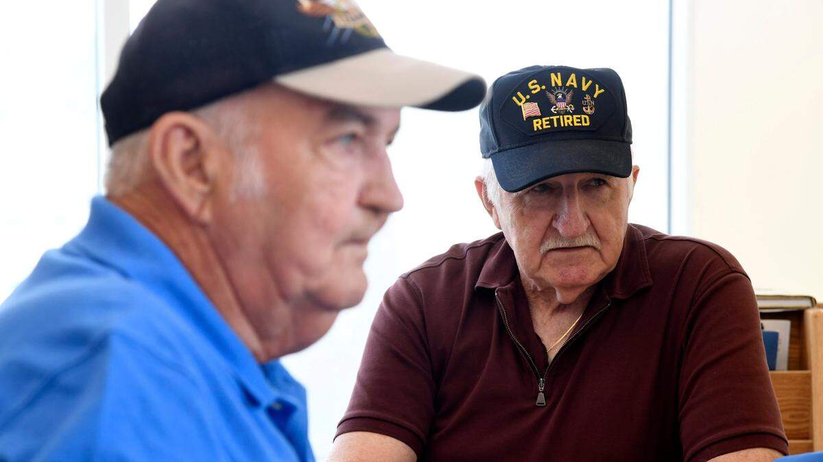 Navy veterans Bobby Jones and Vernon Mack sit at the Georgia Veterans Education Career Transition Resource Center in an open house in 2017. Veterans will be allowed an “open mic” time to talk about their experiences at the annual Veterans Day Celebration at VECTR on Friday.