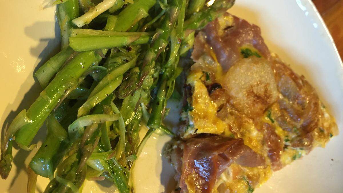 SPECIAL TO THE TELEGRAPH
A Caramelized Onion and Prosciutto Frittata is served with Asparagus Salad.