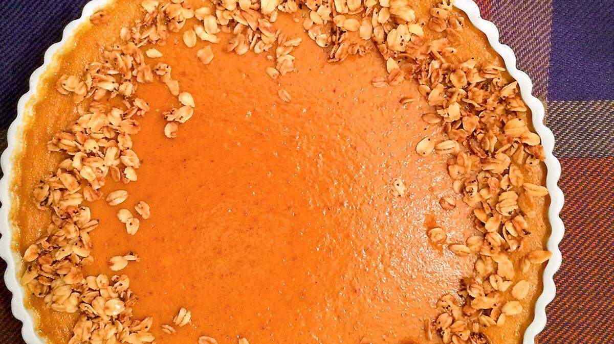 Crustless Pumpkin Pie is served with a simple granola topping for crunch and whipped cream for glamour.