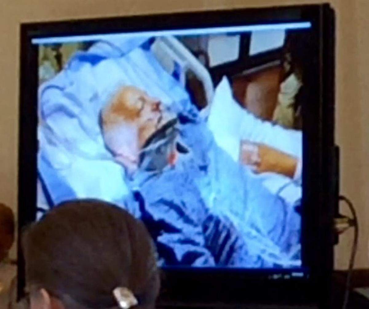 Ralph Elrod shown in a Macon hospital room in video footage from a GBI interview shown in court on Monday in Peach County.
