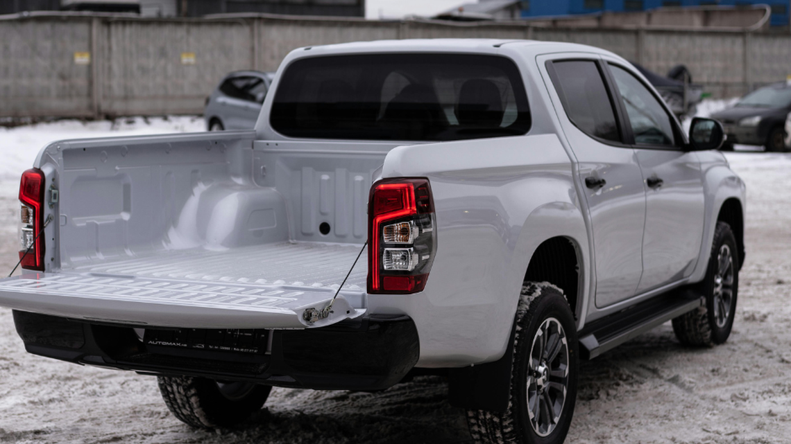 Is it legal to ride in a truck bed in Georgia?