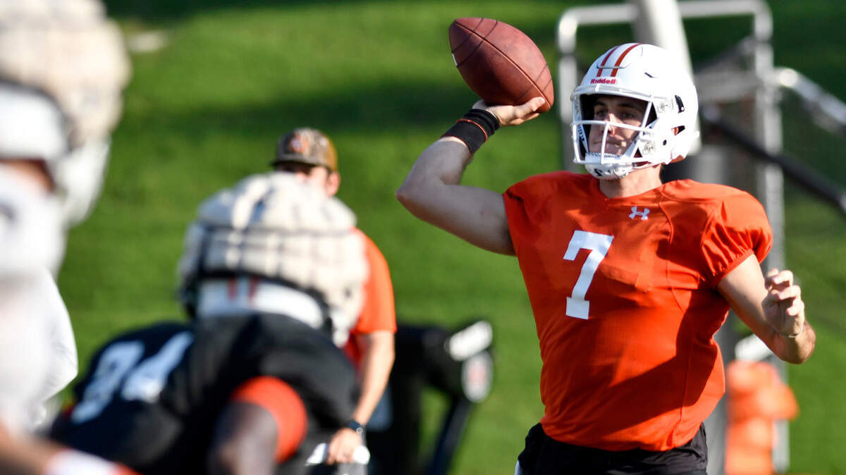 Mercer quarterback Carter Peevy (7) throws a pass during a team practice. Peevy and the Bears defeated North Alabama in their season opener Saturday afternoon.