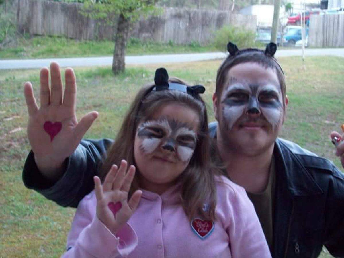 Corey Martin poses with his daughter prior to his cancer diagnosis and arrest.