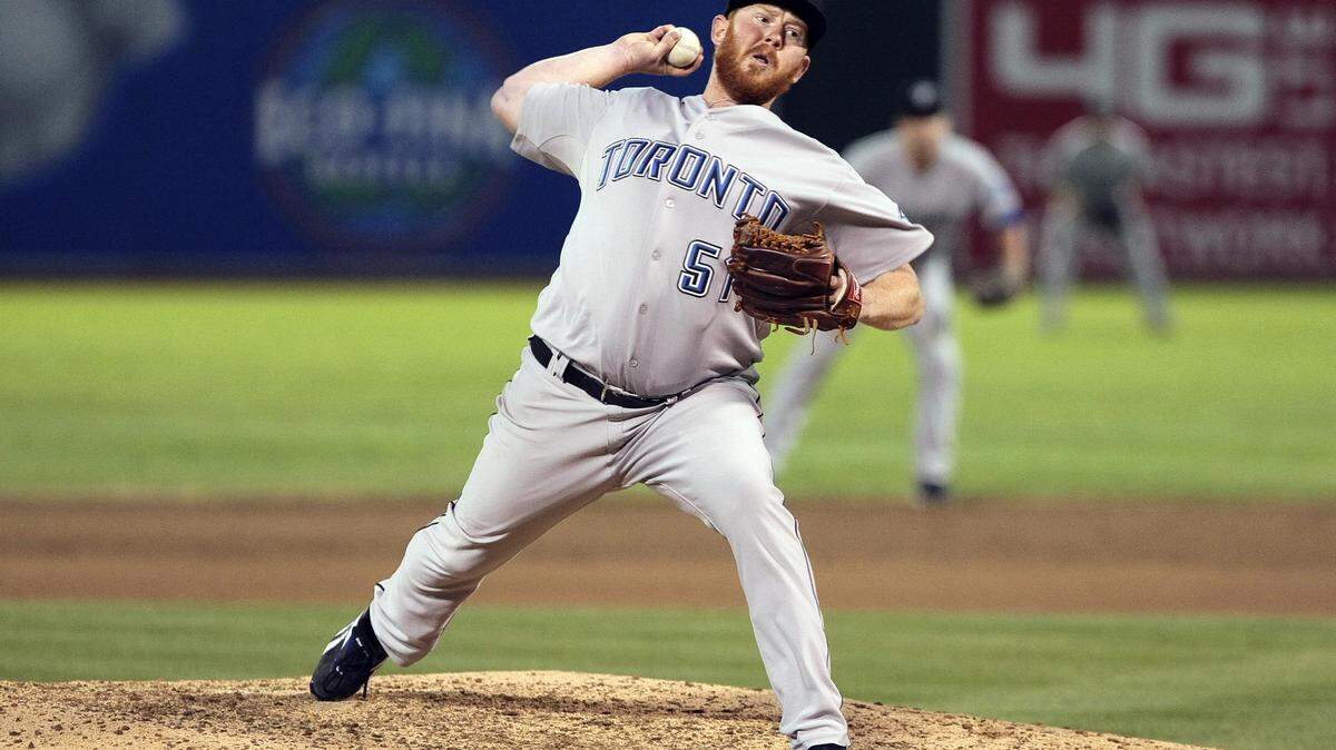 Aug 20, 2011; Oakland, CA, USA; Toronto Blue Jays relief pitcher Jesse Litsch (51) pitches the ball during the eighth inning against the Oakland Athletics at the O.co Coliseum. The Athletics won 5-1. Mandatory Credit: Kelley L Cox-USA TODAY Sports