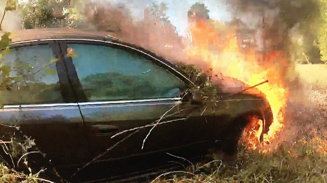 Centerville police officers credited with saving a woman from a burning vehicle after she crashed her car in the 900 block of Collins Avenue.