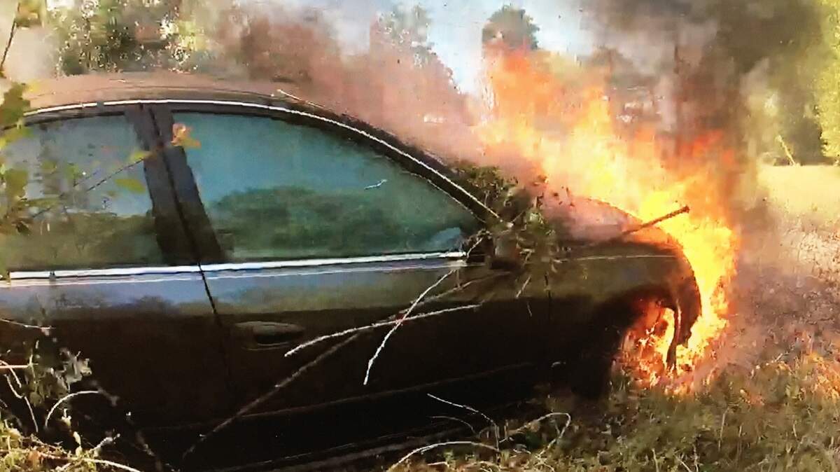 Centerville police officers credited with saving a woman from a burning vehicle after she crashed her car in the 900 block of Collins Avenue.