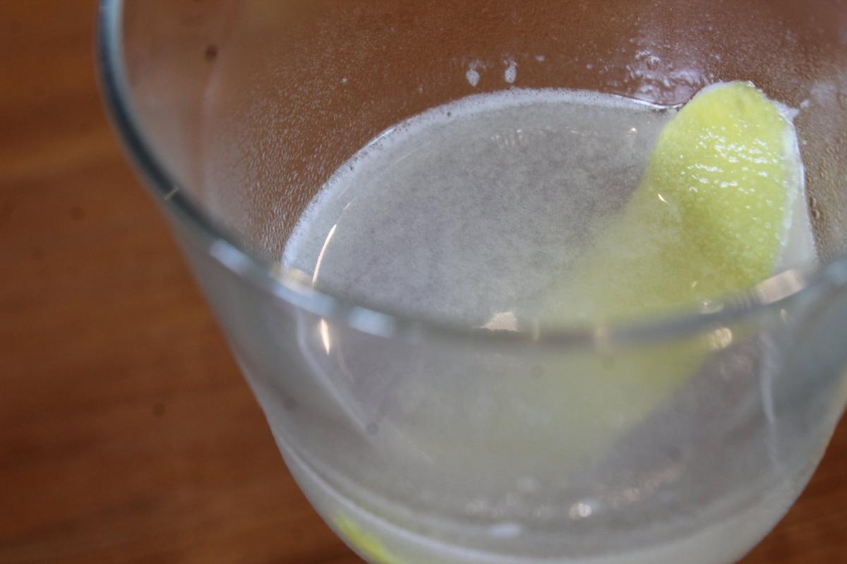 The Summer’s Day sits on the bar at Longleaf Distillery on Saturday, June 8, 2025, in Macon, Georgia. The cocktail is a part of their summer menu and consists of herbal gin, ginger liner and lemon.