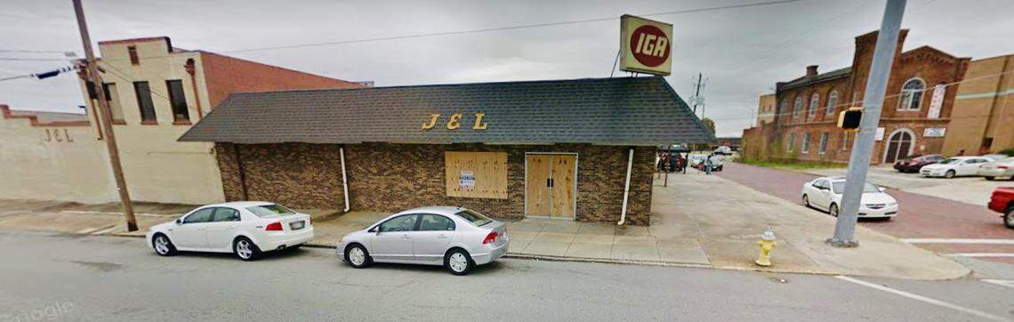 J&L Supermarket, which was boarded up in recent years after closing for good.
