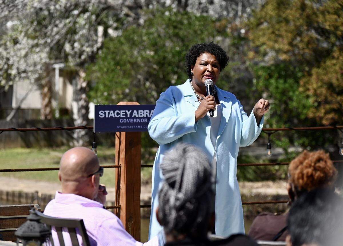 Gubernatorial candidate Stacey Abrams speaks to supporters outside of The Pond restaurant in Warner Robins Monday afternoon. Abrams, who also spoke in Cuthbert and Atlanta, is considered the only Democrat challenger for governor.