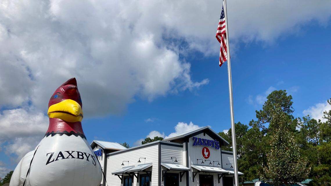 A man is accused of attacking three co-workers at a Zaxby’s location in South Carolina. This file photo was taken at a restaurant in Georgia.