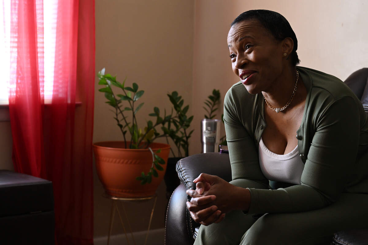 Sandy Colbert laughs while sharing stories of her younger sister Teasha Ariele Colbert in her home on Thursday, Sept. 11, 2025, in Macon, Georgia. Teasha Colbert was pronounced dead at her apartment complex on Thursday in an event that is being investigated as a homicide.