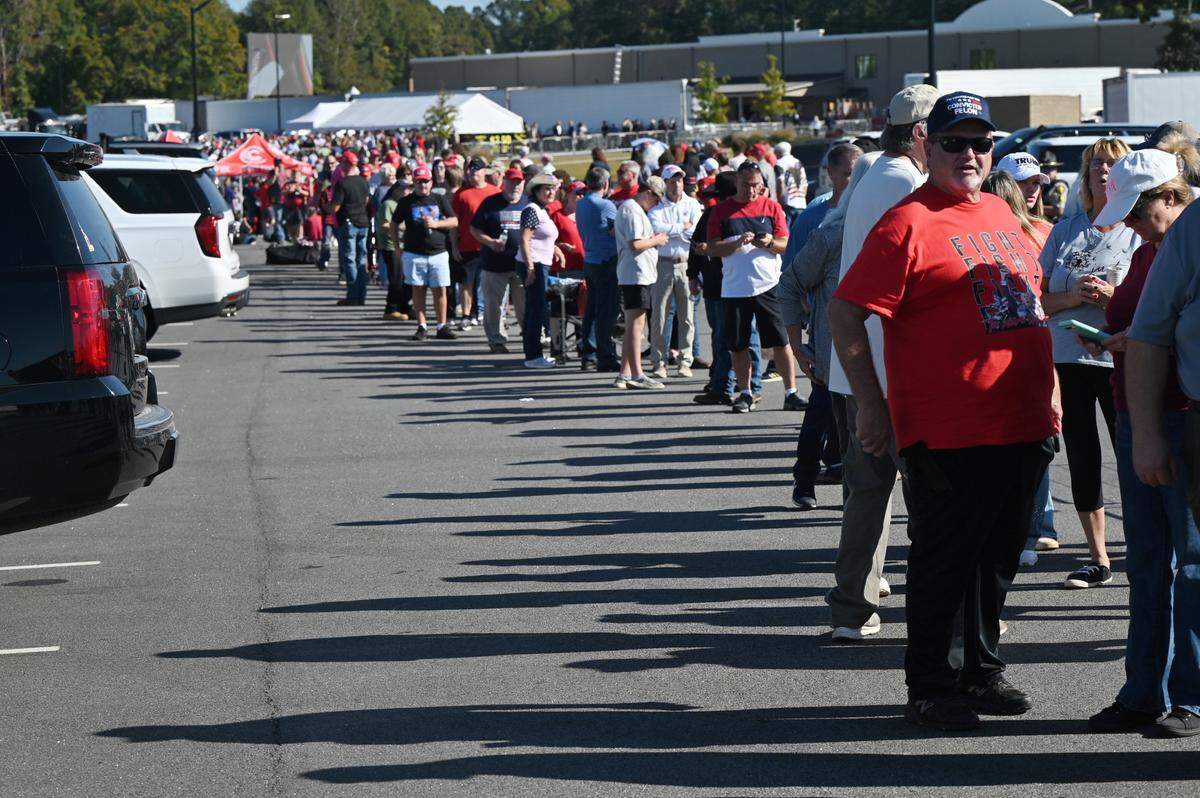 Crowds wait outside of Christ Church Zebulon for the Believers and Ballots Faith Townhall held by former President Donald Trump on Wednesday, Oct. 23, 2024, at Christ Church Zebulon in Zebulon, Georgia.