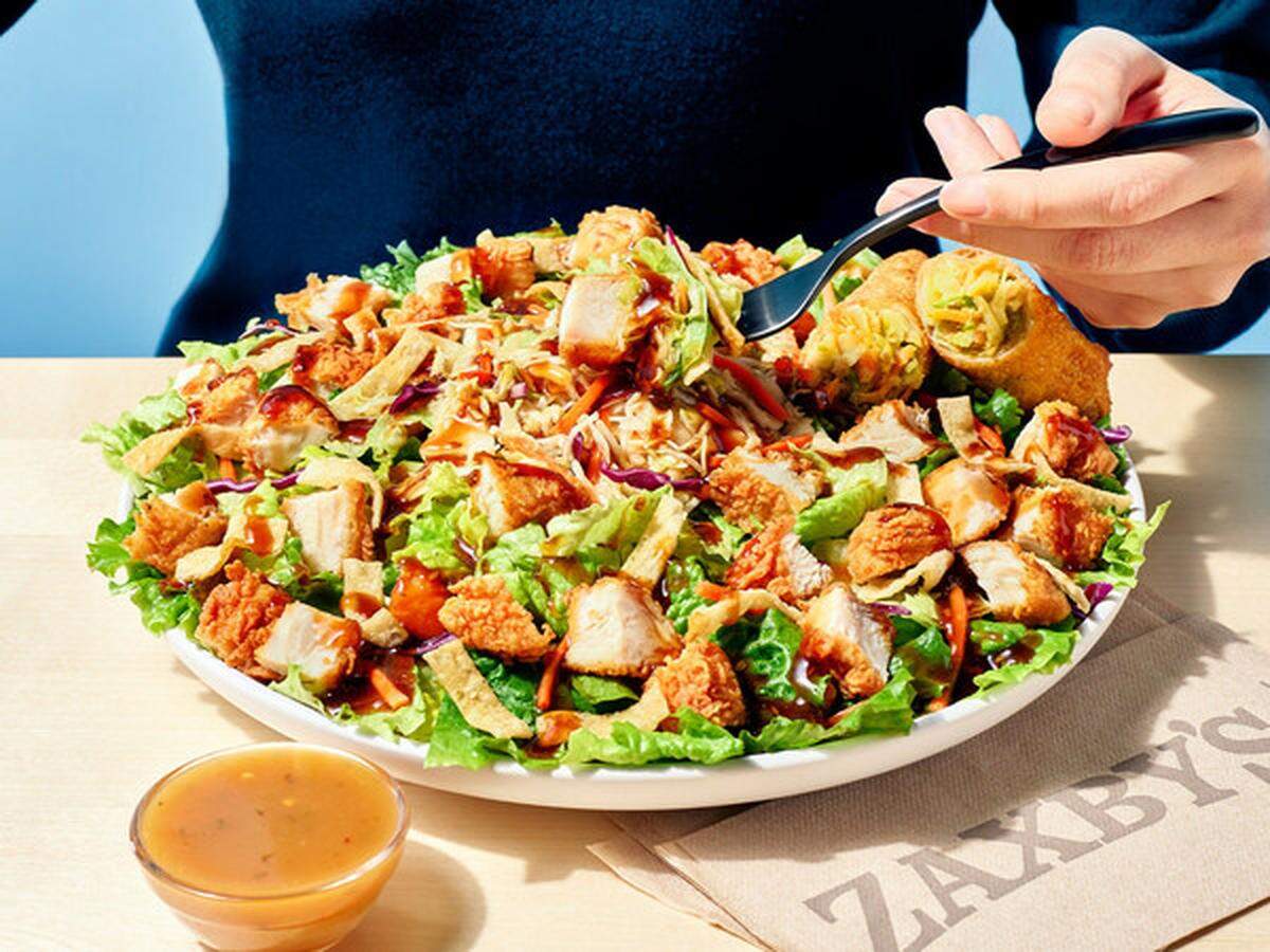 Zaxby’s is bringing back its fan-favorite Asian Zensation Zalad and hand-rolled egg rolls for a limited time.