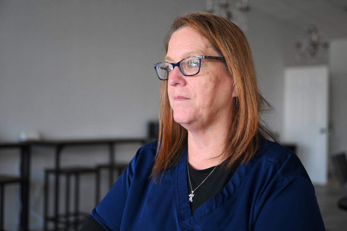 Tracy Flores poses for a portrait on Monday, Sept. 15, 2025, in Warner Robins, Georgia. Barbara Crenshaw, Flores’ aunt, was found dead at Echeconnee Creek in 1996, an alleged homicide case that was still unsolved by September 2025.