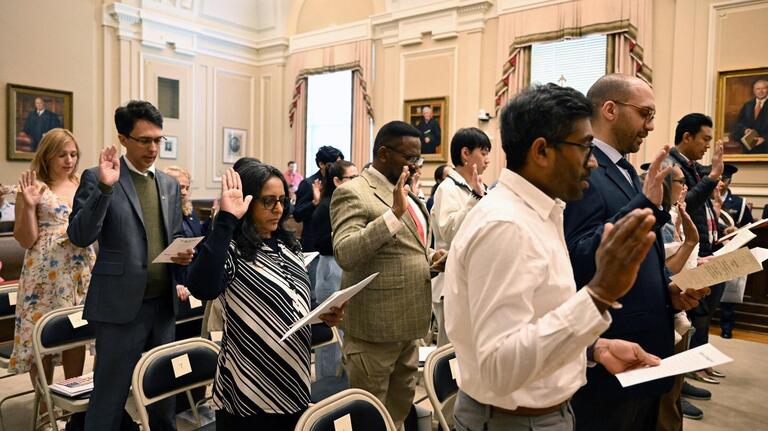 New US citizens talk about ICE, Trump & freedom at Macon naturalization ceremony