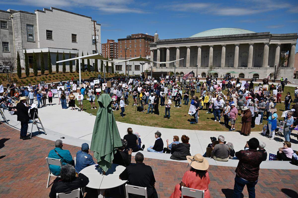 Several hundred attendees gathered in Rosa Parks Square on March 28, 2026, in downtown Macon, Ga., as part of a national day of protest against President Donald Trump’s administration.