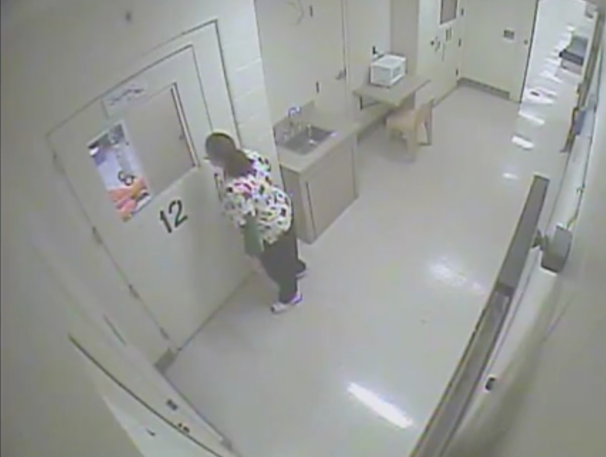 Surveillance footage shows a CorrectHealth nurse who peered into the Cherokee County jail cell of Demetrie Jones, a 32-year-old inmate who had collapsed in December 2014. He died in his cell after she walked away.