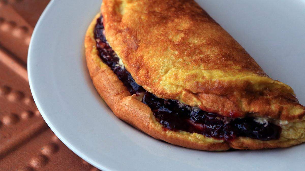 A Schaumomelett, a sweet German treat, mixes the beaten egg yolks of a standard omelet with the whipped egg whites of a souffle. When heated on the stove, this mixture cooks into a dish that is ethereally light and delicious.