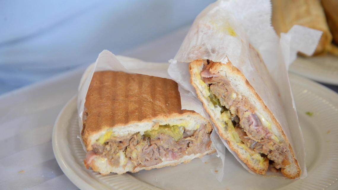 JENNA EASON/THE TELEGRAPH Macon, GA, 07/17/2019: The Cuban sandwich at 3 Countries Restaurant is one of the most popular items on the menu. Reporter Justin Baxley ordered the sandwich to try for #FoodieFriday.