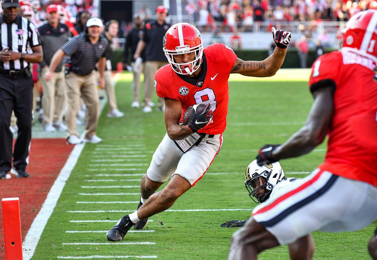 Georgia wide receiver Dominick Blaylock rounds the end and heads for the endzone to give Georgia a 21-0 lead over Vanderbilt going in to the half-time.