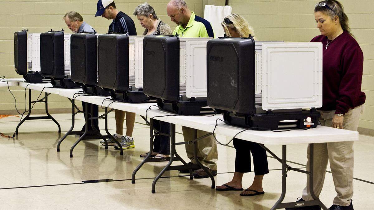 People vote at Mikado Baptist Church on Houston Road in this file photo.