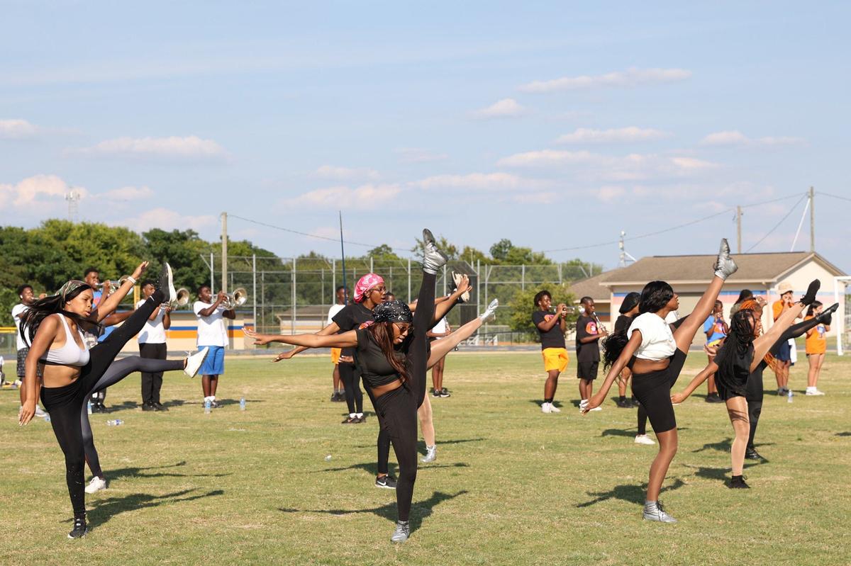 Members of Sugarettes practice a routine during Central High School Marching Sugarbear Band practice on Monday, Aug. 12, 2024, in Macon, Georgia. The Sugarbear Band won the Telegraph’s Best Marching Band in Middle Georgia poll.