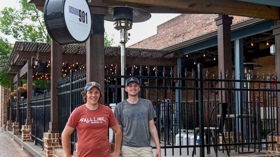 From left, Patio 901 owners Eric Schultz and Charlie Shimp. The business partners have rebranded their popular outdoor venue previously known as Hazard’s on the Green at 901 Carroll St. in downtown Perry.