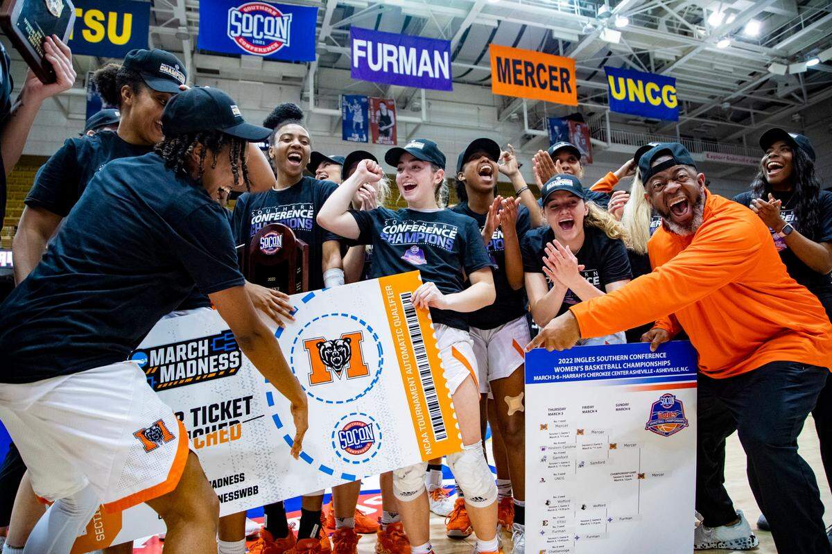 The Mercer women’s basketball team celebrates after defeating Furman 73-54 in the SoCon Ingles Basketball Championship Saturday afternoon at the Harrah’s Cherokee Center in Asheville, N.C.