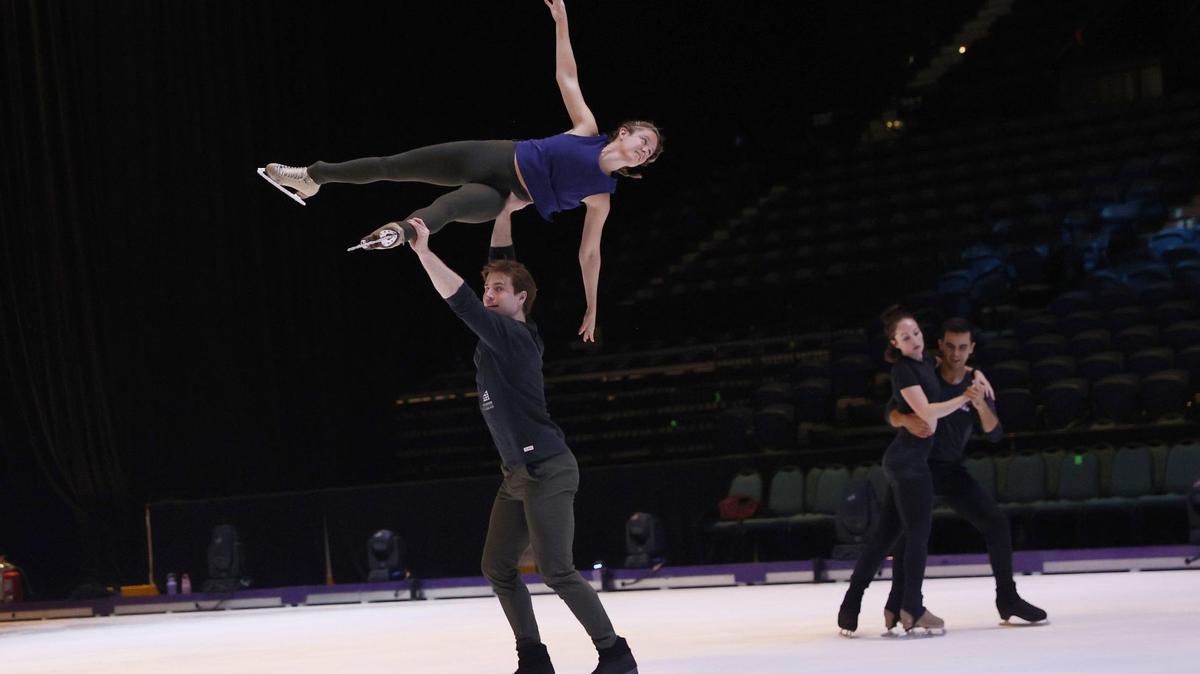 Disney of Ice skater Blake Eisnach lifts skater Kirstie Nelson during rehearsal for “Into the Magic” Disney on Ice tour on Friday, Nov. 1, 2024, at the Macon Coliseum in Macon, Georgia. The world tour will start its run in Macon on Friday night, with shows throughout the weekend.