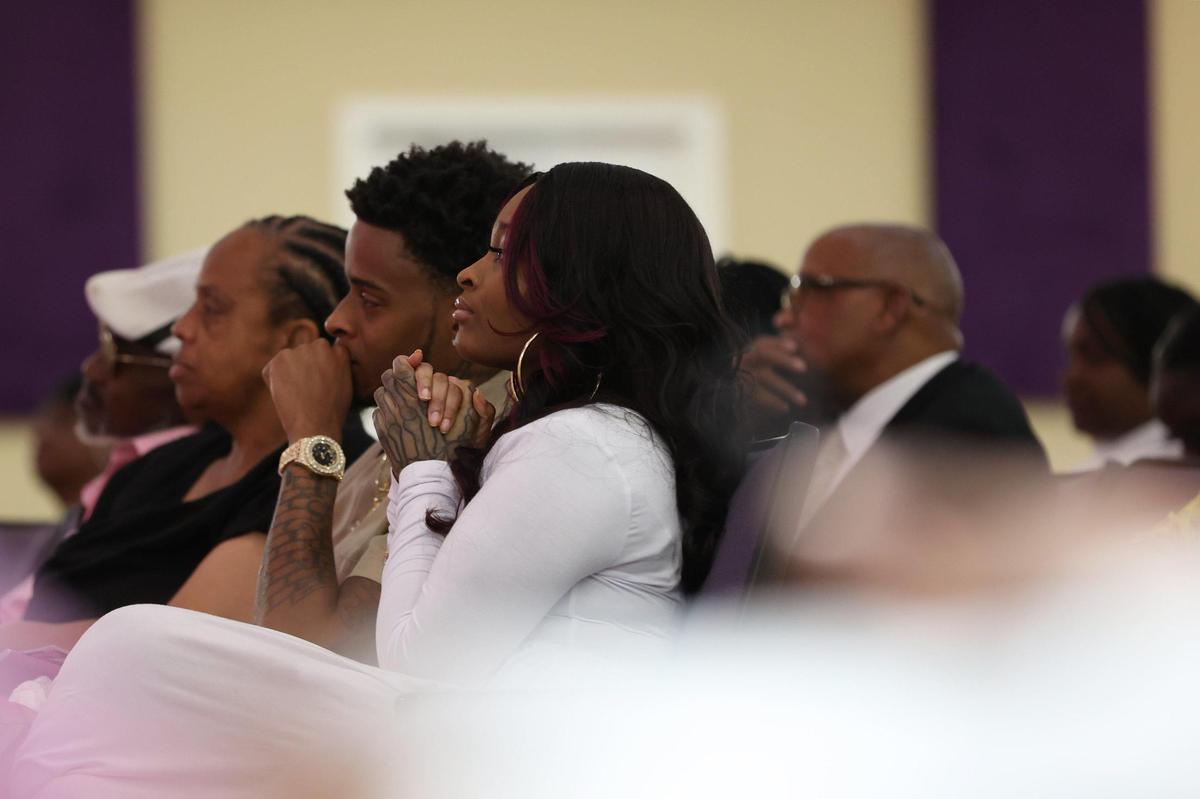Janique Fritzgerald, mother of A’Layah Joyner, listens to the eulogy with hands clasped during the funeral of A’Layah Danielle Joyner on Saturday, April 26, 2025, at Macedonia Baptist Church in Macon, Georgia. The death of 2-year-old A’Layah Joyner and three other women in Perry, Georgia is being investigated as a homicide by the Perry Police Department.