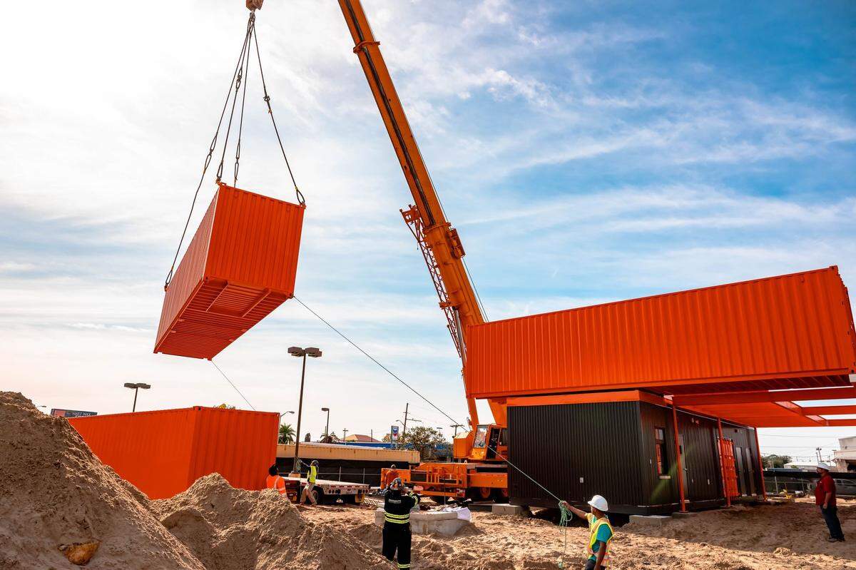 Smalls Sliders are built with 800-square-foot, repurposed shipping containers called “cans” and “dropped” on site.