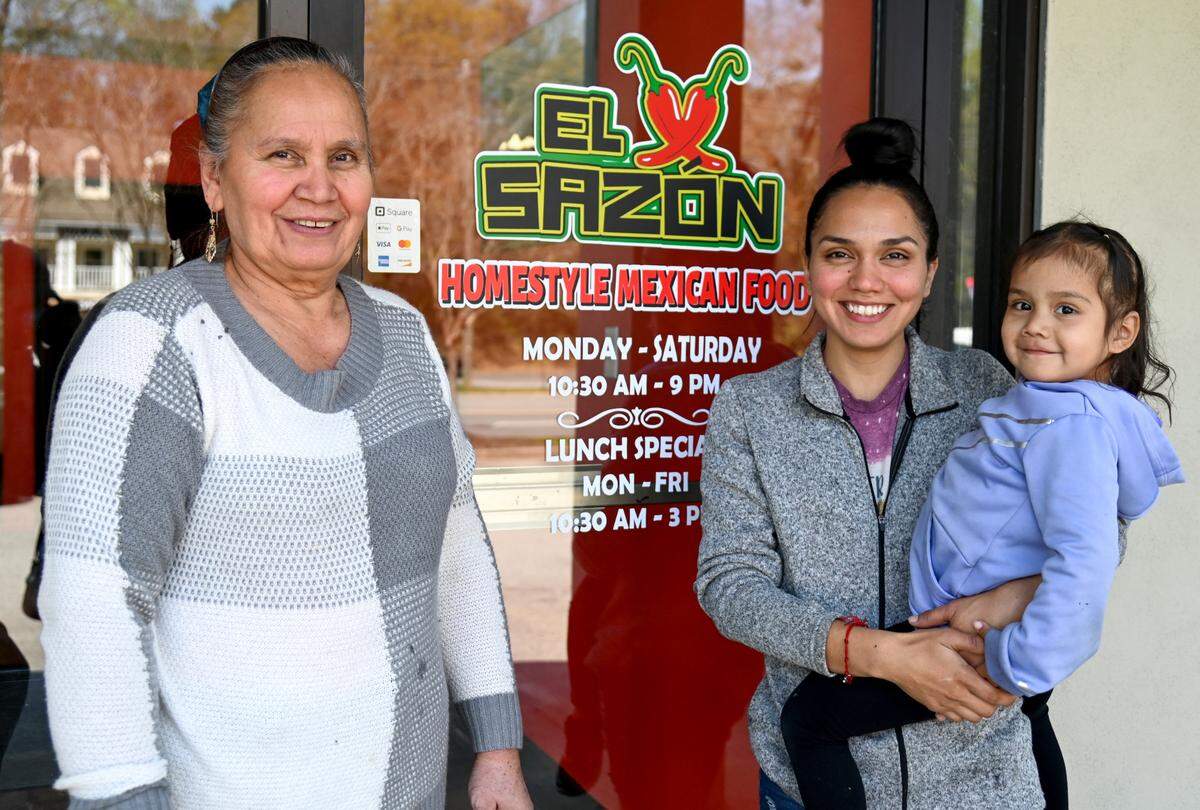 Brenda Torres with her mom Lorenza and daughter Soroya, 3, at El Sazon Homestyle Mexican Food in Macon.