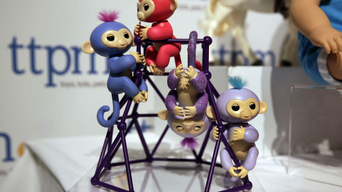 This Tuesday, Sept. 26, 2017, photo shows Fingerlings from WowWee on display at the 2017 TTPM Holiday Showcase in New York. Shoppers rushing to find Fingerlings, the robotic monkeys that are one of the holiday season’s hottest toys and already hard to find, say they’ve been fooled into buying fakes.