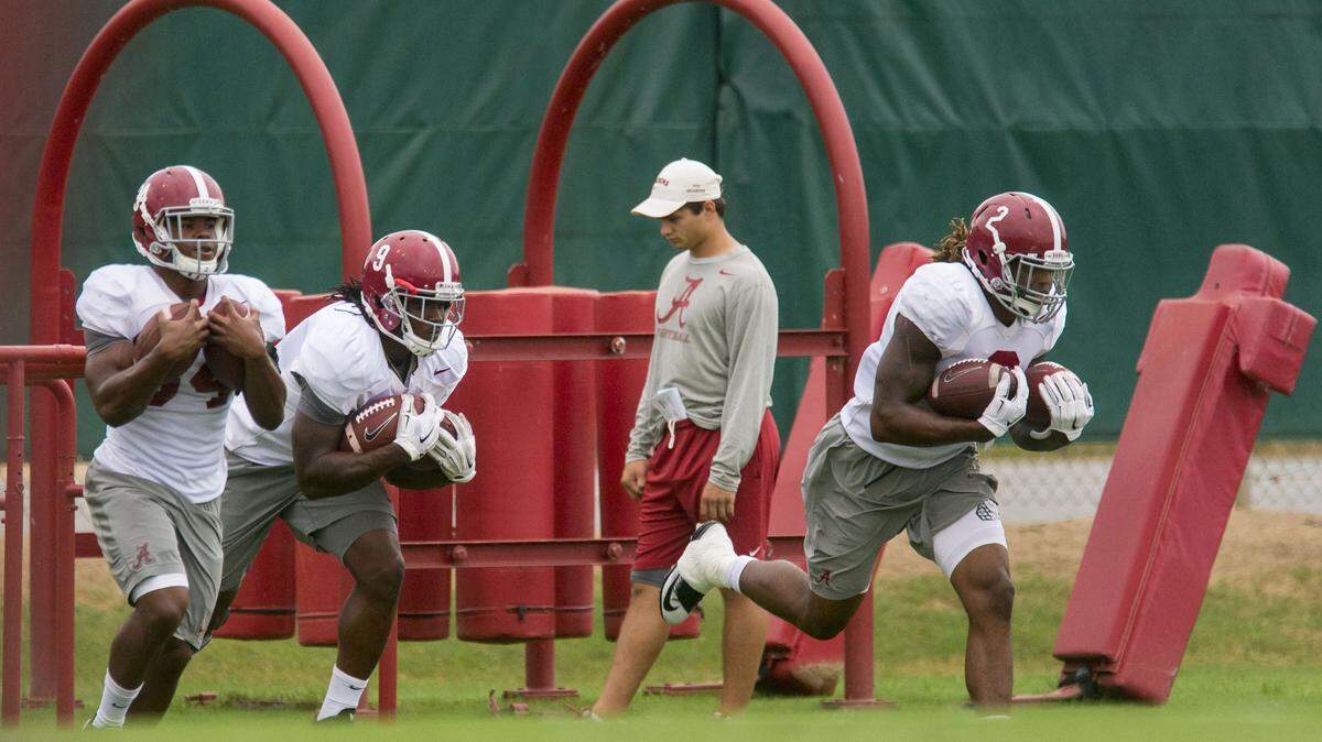 Alabama running backs Damien Harris (34), Bo Scarbrough (9) and Derrick Henry (2) work through drills during an NCAA college football practice, Monday, Sept. 28, 2015, in Tuscaloosa, Ala. (Vasha Hunt/AL.com via AP) MAGS OUT; MANDATORY CREDIT