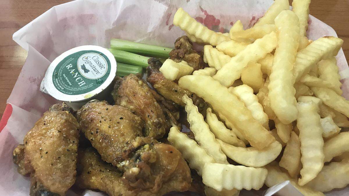 Lemon pepper wings combo is one of the options at Buffalo Grill.