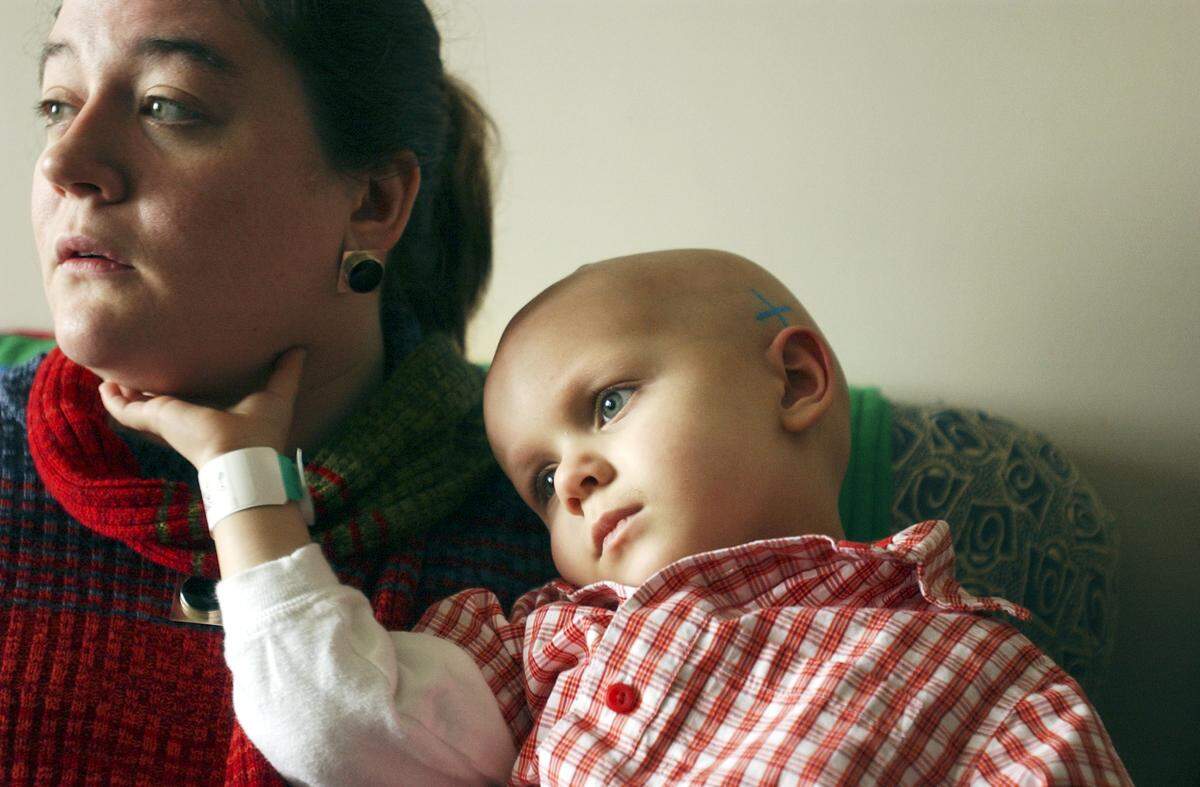 In this 2004 file photo, Melissa Lacefield shares the story of her son Elliot, then 2, during his cancer treatment at St. Jude Children’s Research Hospital in Memphis.