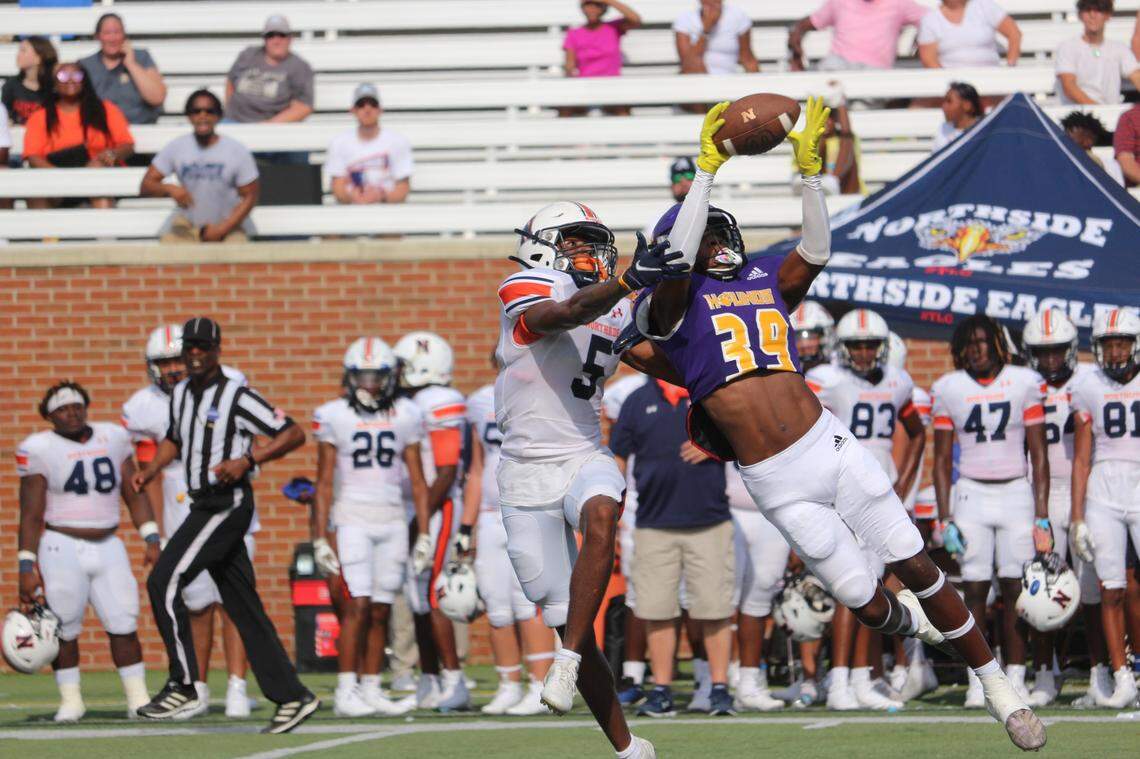 Jones County’s Javion Washington breaks up a pass from Northside’s Damien Dee to Duke McClinton during the first half of their Saturday afternoon matchup.