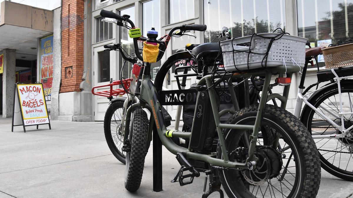 Bicycles sit outside of Macon Bagels during the morning Macon Car Free Day meetup on Friday, May 24, 2024, in Macon, Georgia. Macon Car Free Day is an annual event sponsored by Bike Walk Macon that encourages alternative transportation throughout the city.