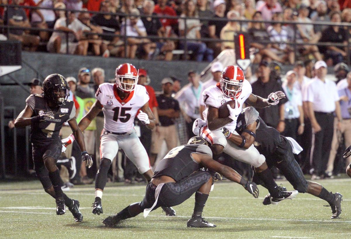 Georgia running back D’Andre Swift (7) is tackled after a first down run during the Bulldogs’ game against Vanderbilt Saturday night.