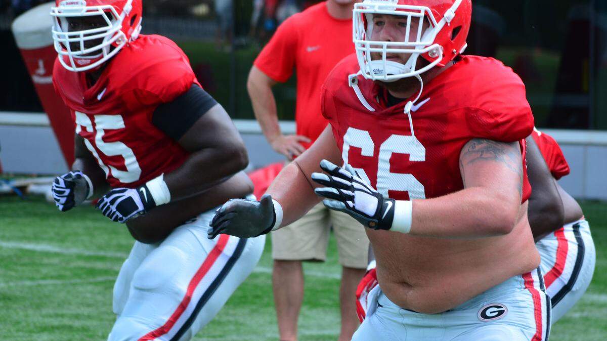 Georgia offensive lineman Hunter Long (66) goes through a drill during a Bulldogs practice earlier this month.