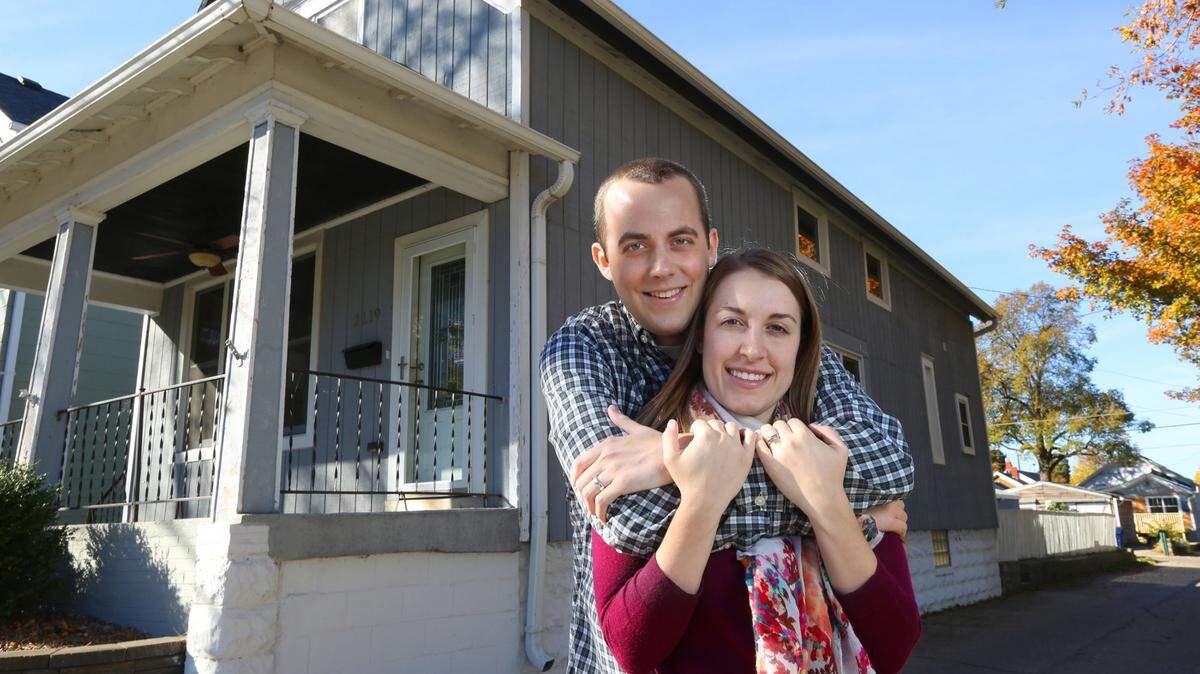 Jay Matuska and Jaclyn Sitkowski stand outside their home Milwaukee last month.