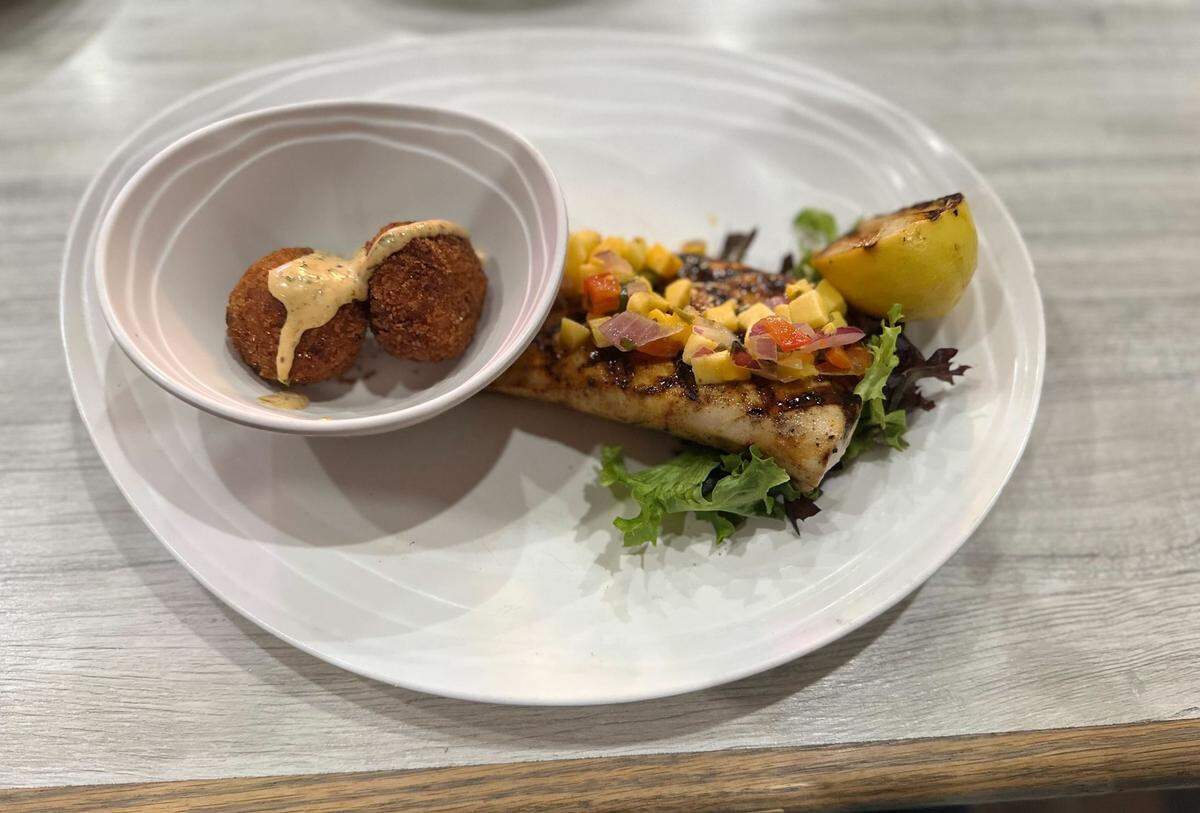 The Mahi Jezebel and Jam Pups are a hit at Kudzu Seafood Company in Macon, Georgia.