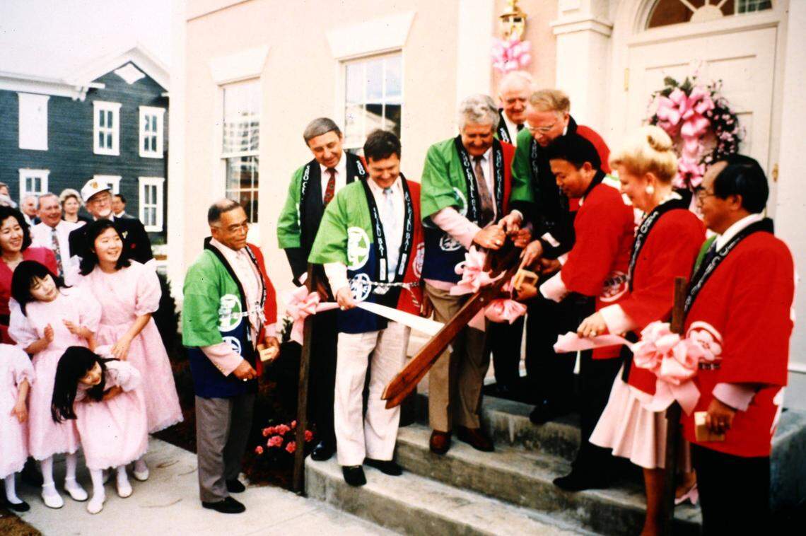 Officials attend the dedication of the Cherry Blossom Headquarters by YKK in 1991.