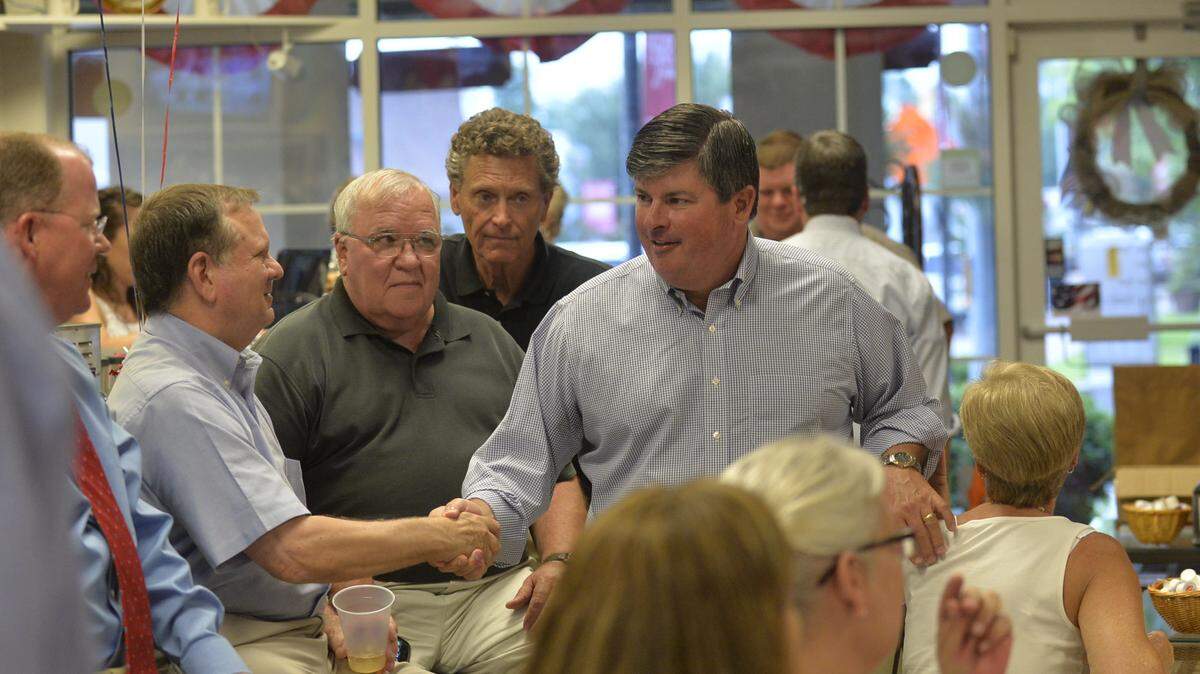 Larry Walker III greets guests as he arrives at his party's headquarters July 14, 2015 while he was a candidate for the state House District 146 seat.