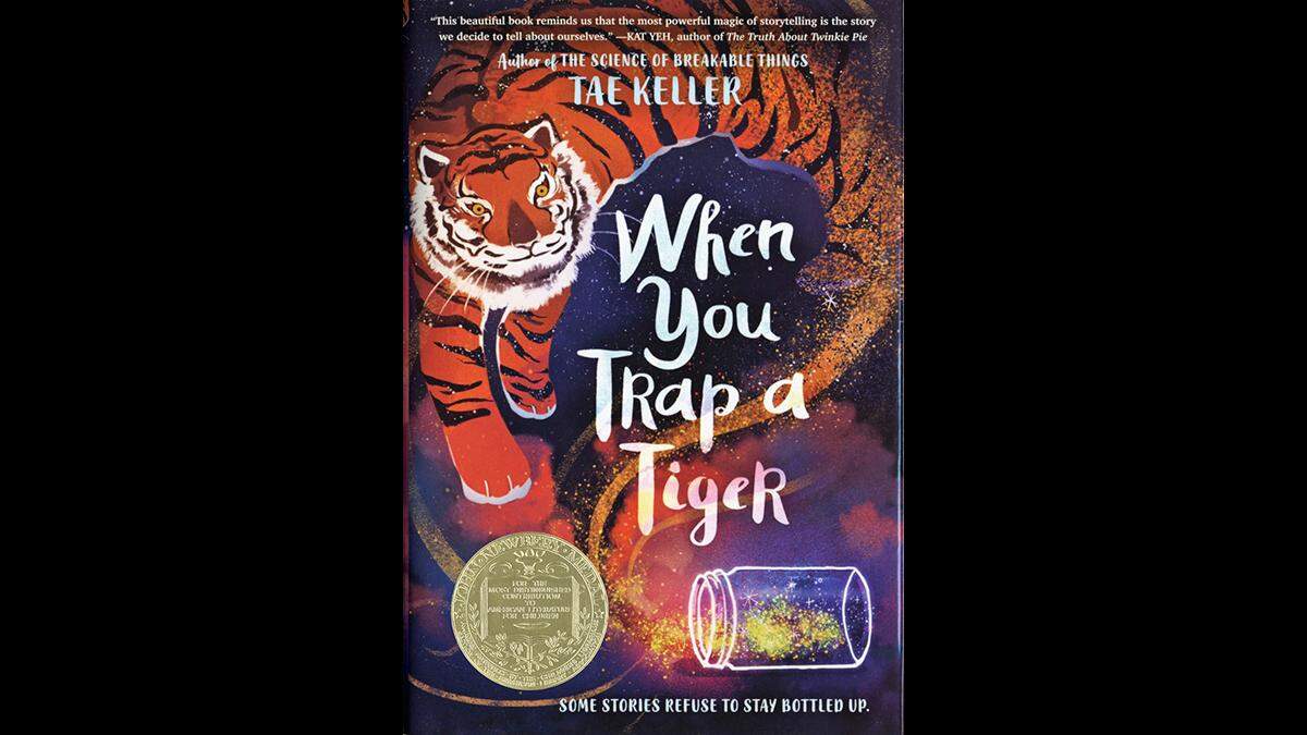The cover for the 2021 Newbery Medal winner, “When You Trap a Tiger” by Tae Keller.