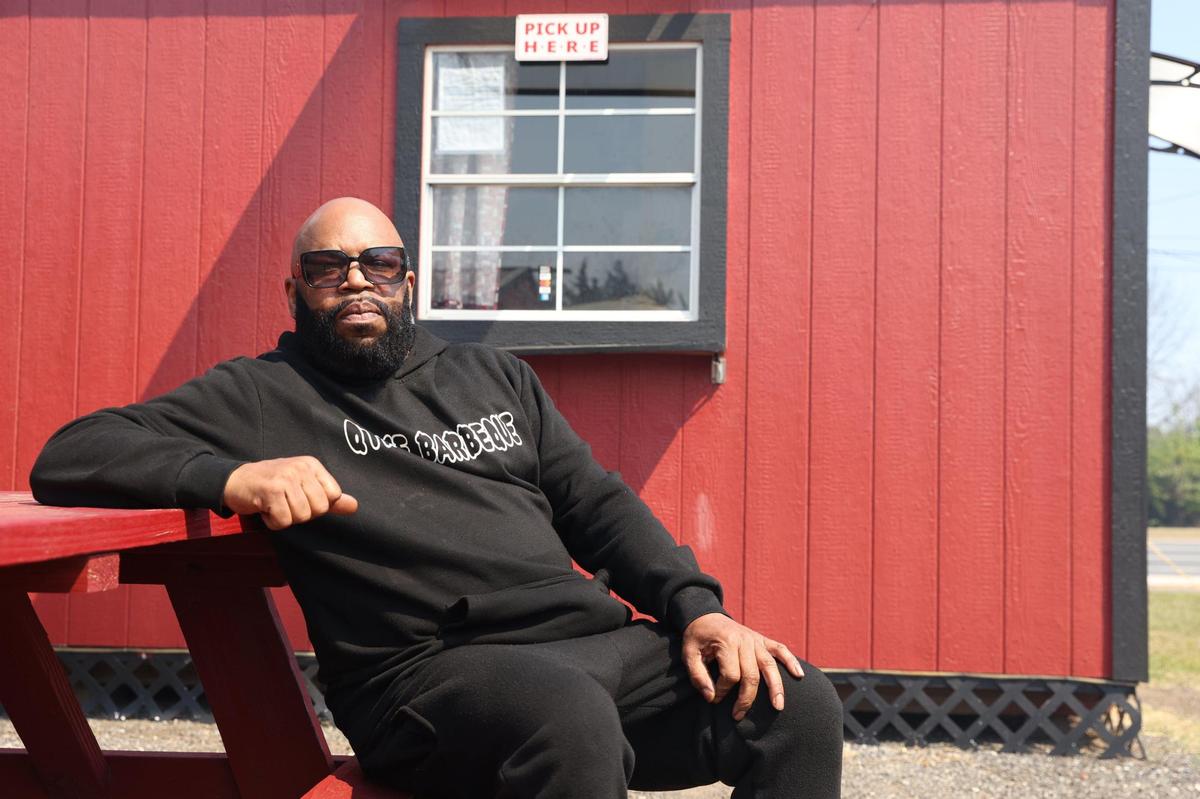 Q Time Barbecue owner Robert Parker poses outside of the restaurant on Friday, March 21, 2025, in Warner Robins, Georgia. Parker uses his own unique rub and sauce for Q Time Barbecue.