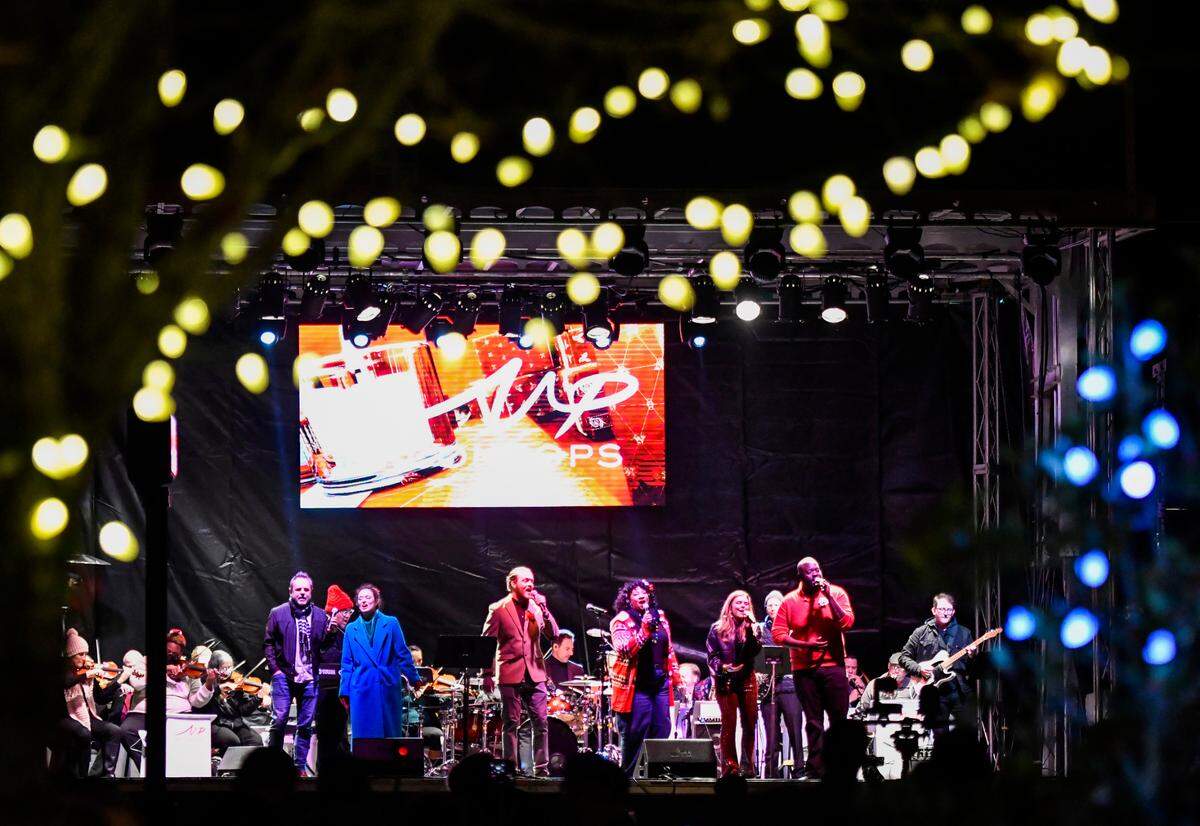 Guest singers perform with The Macon Pops in 2022 during opening night of the Macon Christmas Light Extravaganza.