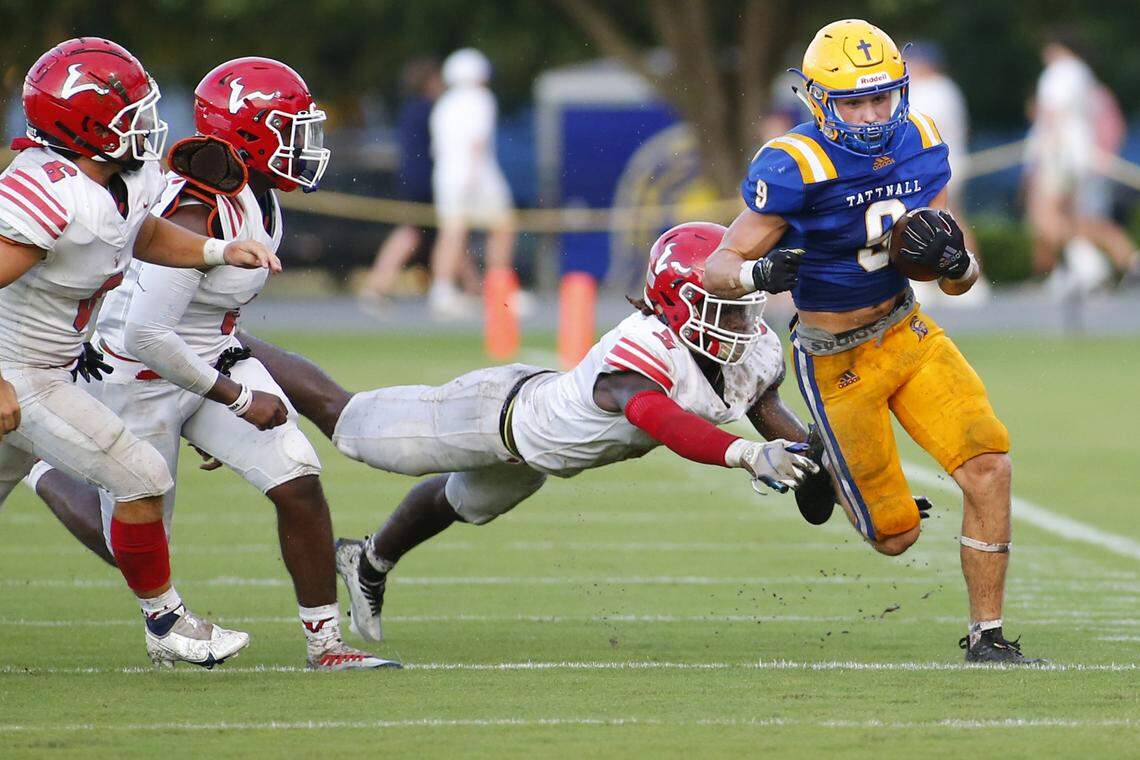 Trojan #9 Brayden Smithturned the corner and is forced out of bounds on the opening drive.Special to the Telegraph by Donn Kester 8/26/2022